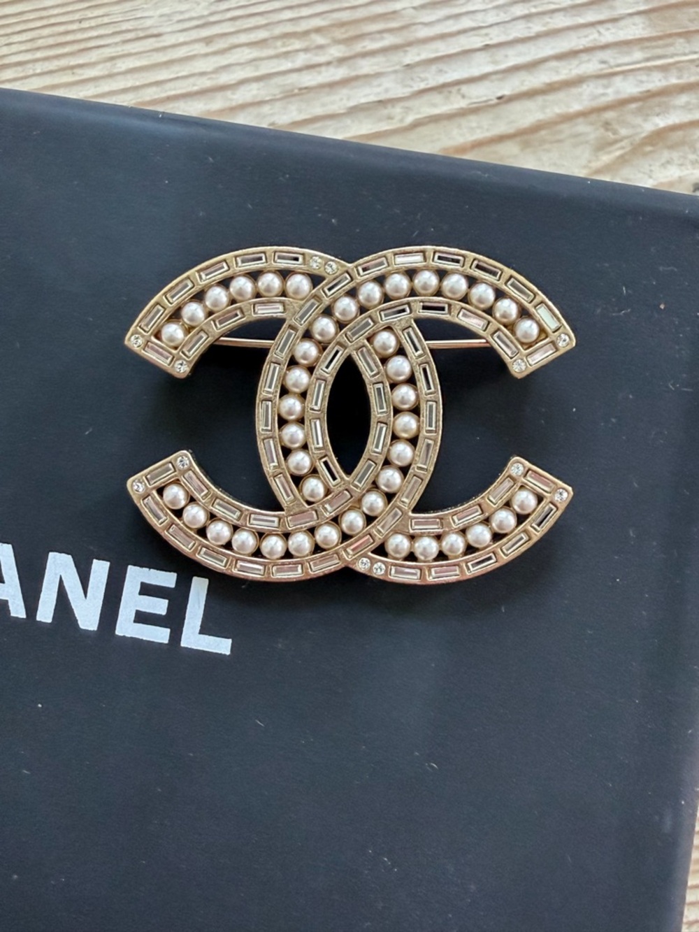 CHANEL Gold and Pearl Interlocking CC Brooch